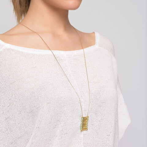 Brass pendant with macrame