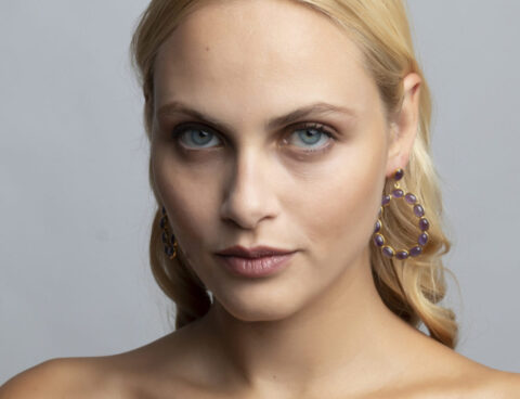 Gold platted earrings with amethyst circle