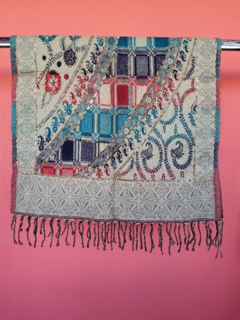 A very soft acrylic shawl with handmade embroidery