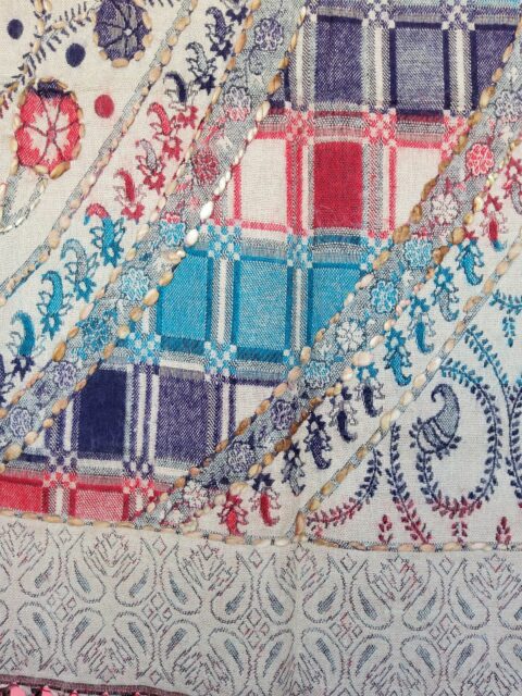 A very soft acrylic shawl with handmade embroidery