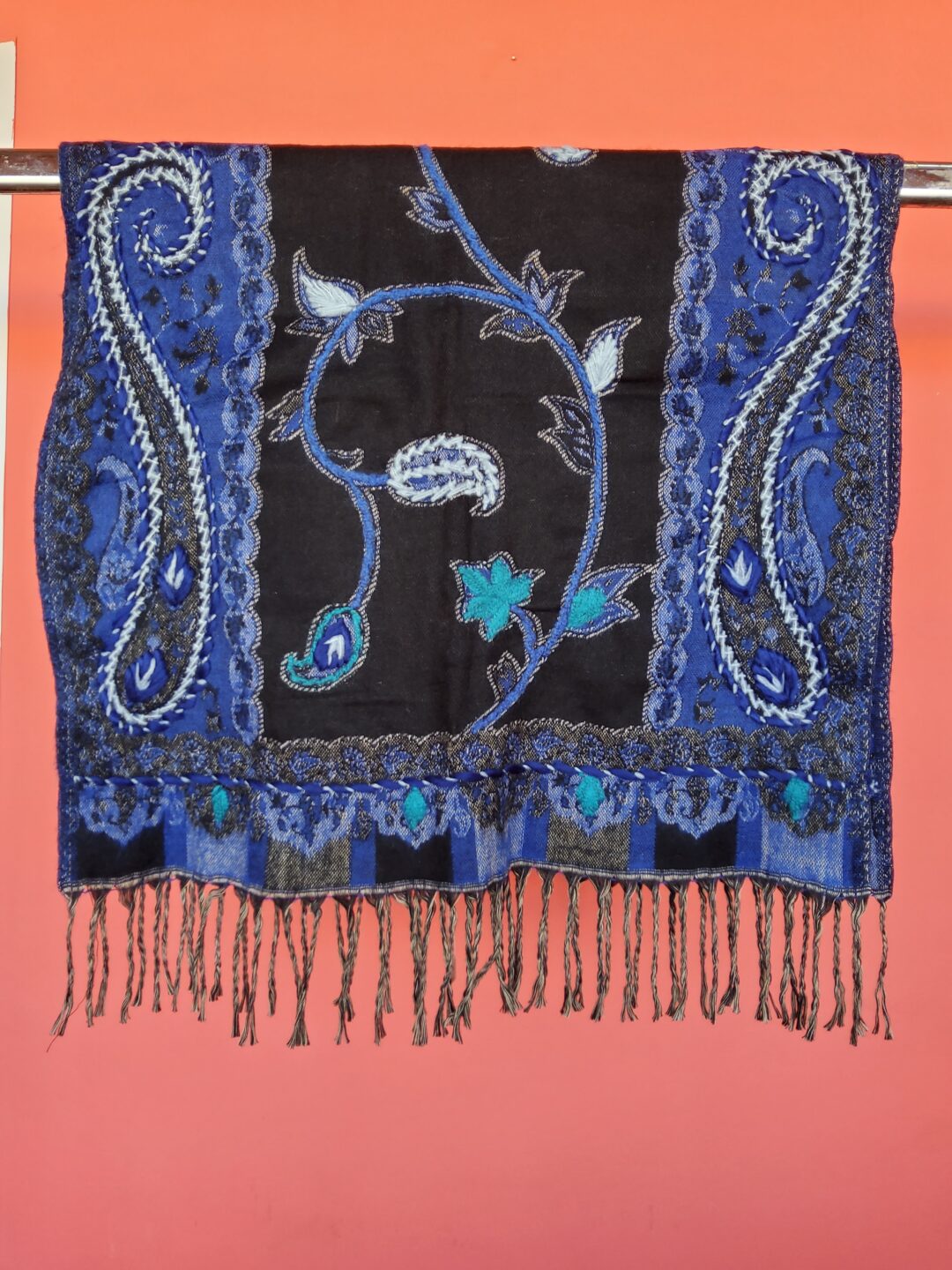 A very soft acrylic shawl with handmade embroidery