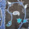 A very soft acrylic shawl with handmade embroidery