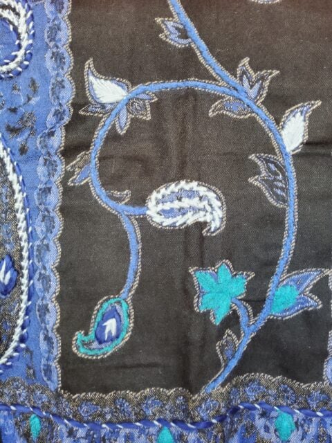 A very soft acrylic shawl with handmade embroidery