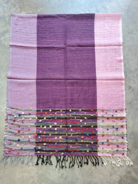 A very lightweight woolen shawl for all seasons, with stripes in white and grey color.