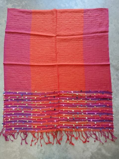 A very lightweight woolen shawl for all seasons, with stripes in magenta and purple color.