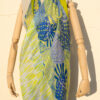A very soft an elegant shawl in blue color with yellow details.