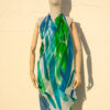 A very soft an elegant shawl in blue color with multicolor details.
