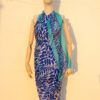 A very soft an elegant shawl in blue color with white and turquoise details.