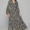 A classy long dress in boho-chic style that will make you stand out with your flair and elegance. Its stunning color, high-neck cut and peacock pattern will make it a statement piece in your wardrobe and will fit in any occasion this summer.
