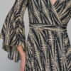 A classy long dress in boho-chic style that will make you stand out with your flair and elegance. Its stunning color, high-neck cut and peacock pattern will make it a statement piece in your wardrobe and will fit in any occasion this summer.