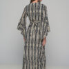 A classy long dress in boho-chic style that will make you stand out with your flair and elegance. Its stunning color, high-neck cut and peacock pattern will make it a statement piece in your wardrobe and will fit in any occasion this summer.