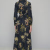 Feel free and totally cool in your soft feminine energy with the shirt button dress banana black.