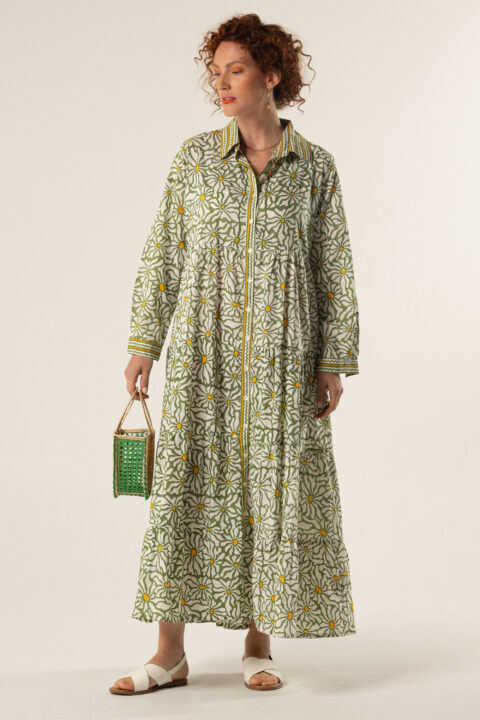 Model wearing Ikaria long cotton dress in daisy green block print with yellow details