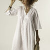 Model wearing Marsha Long White Cotton Embroidered Dress – maxi cotton dress with V-neck and 3/4 sleeves