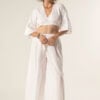 Model wearing Anna Wide-Leg Trousers – white cotton embroidered pants with elastic waist and relaxed fit