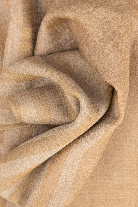 Beige striped 100% cashmere pashmina shawl folded and detailed weave close-up