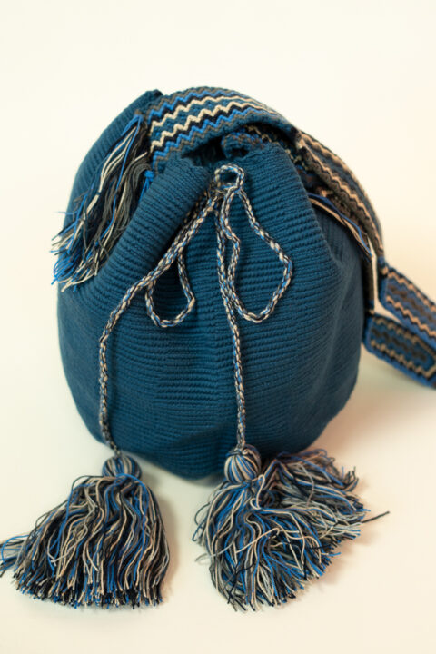 Handmade Wayuu bag – blue woven shoulder bag with tassels crafted by Colombian artisans