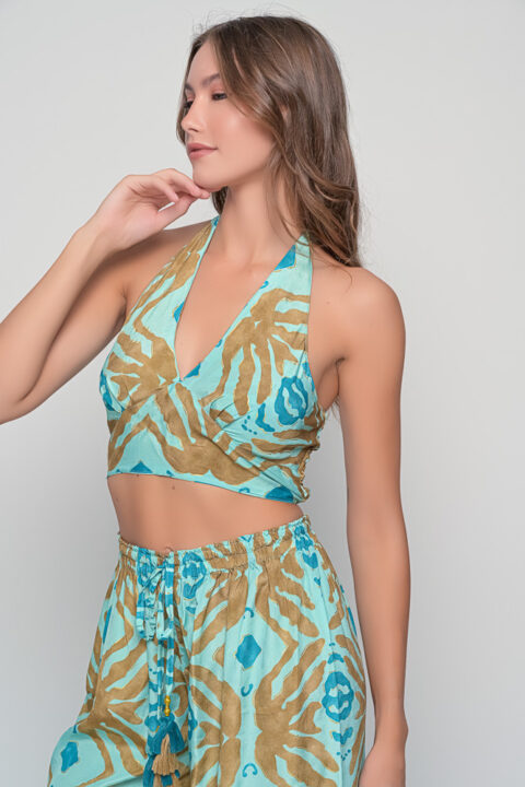 Ios Top in Seaweed Turquoise Print with golden details and elastic back, one-size saree silk halter top by Knowmad.