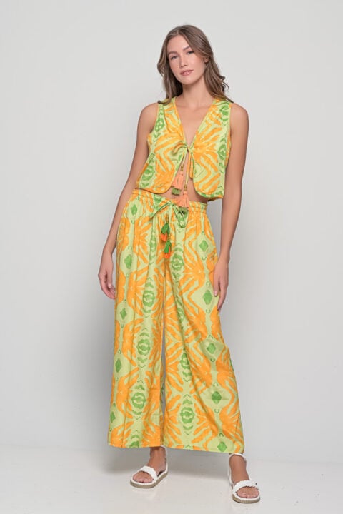 Anna trousers in Seaweed Green Print with golden details, one-size saree silk pants by Knowmad.