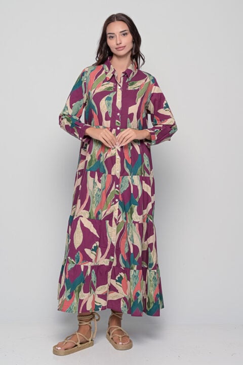 Model wearing Ikaria long cotton dress in Alpinia Purple print with button-down front