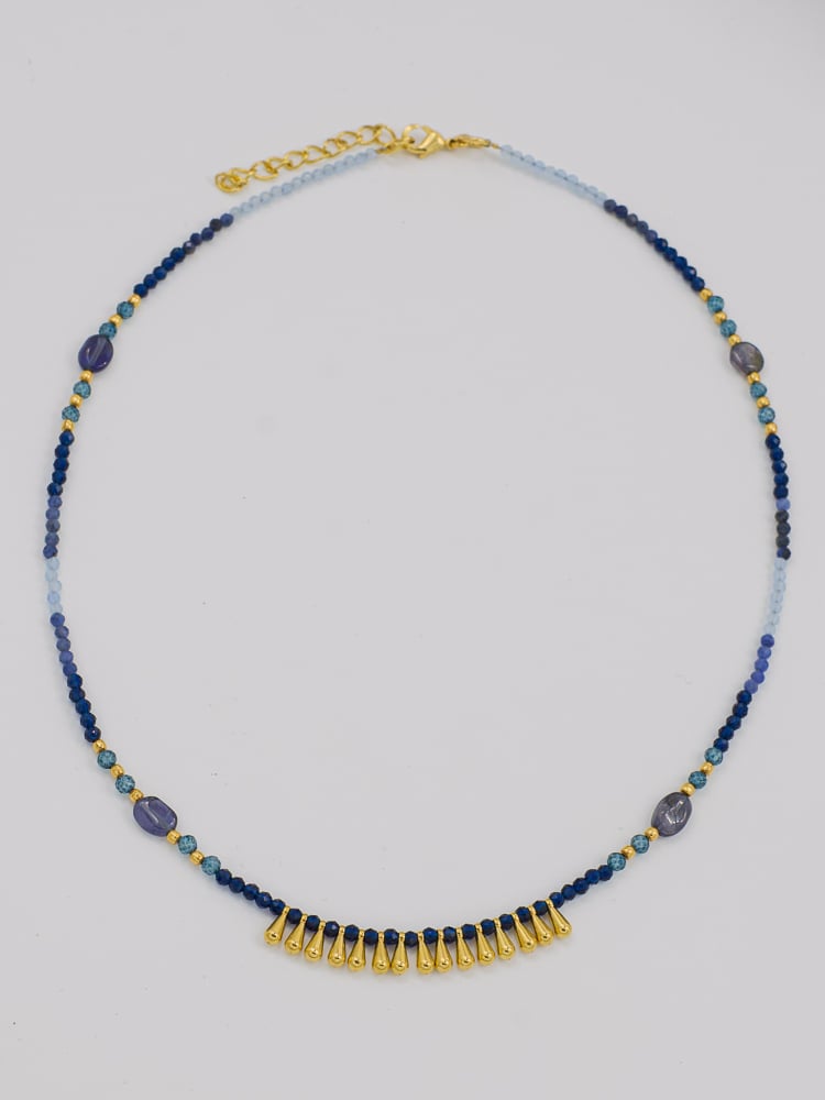 blue gemstone necklace with gold plated details
