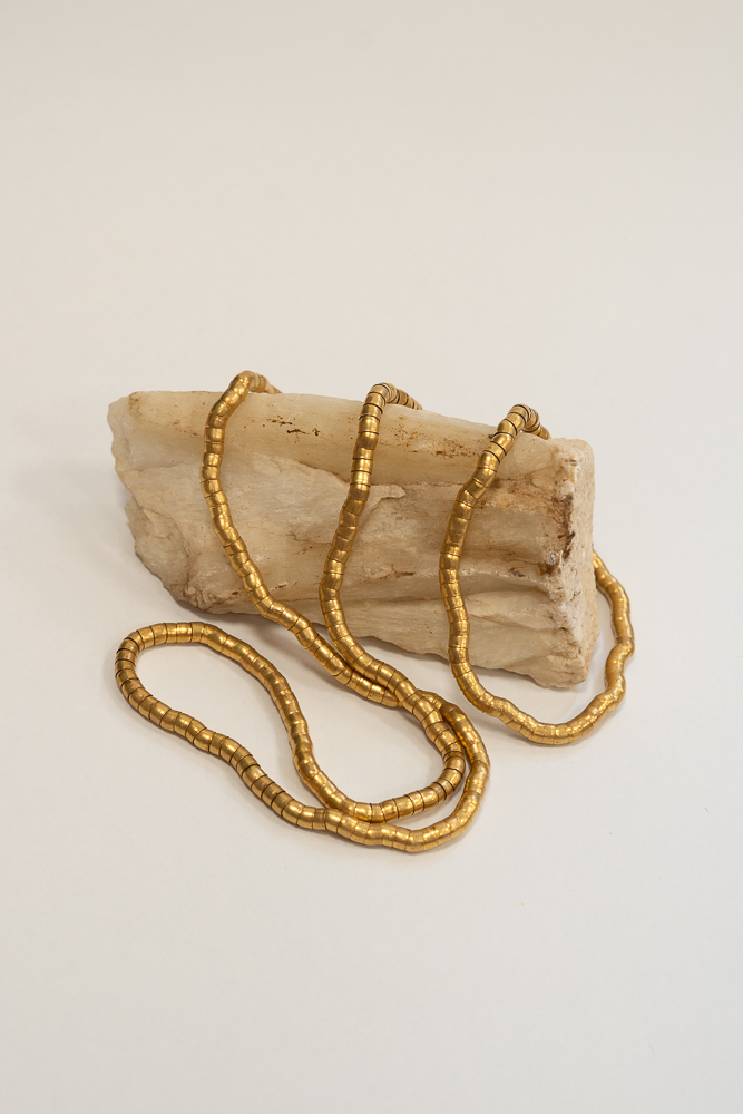 Long gold-plated brass necklace that can be worn single, double or layered with other necklaces.