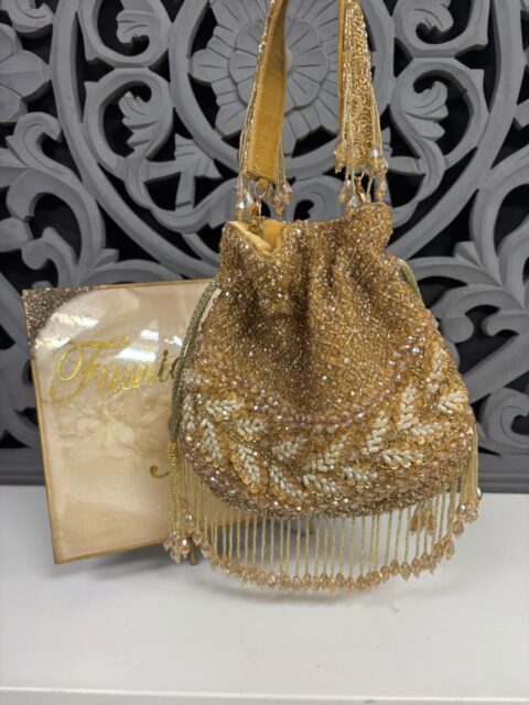 Handmade bronze beaded handbag with intricate beadwork